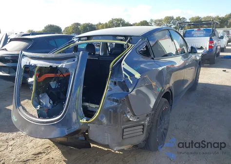 2023 Tesla Model Y Rwd from USA, damaged, VIN 7SAYGDED2PF960954